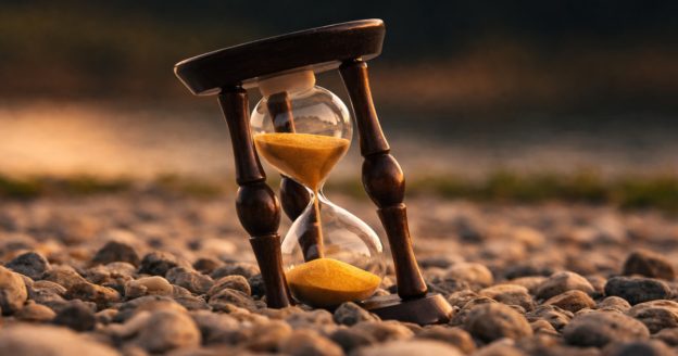 Hourglass and pebbles